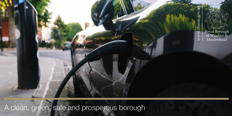 Close up image of electric vehicle being charged on residential street. A clean, green, safe and prosperous borough